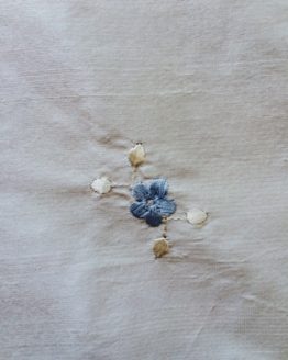 Embroidered blue cluster detail