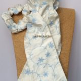 Ivory embroidered blue flower pure silk stock self tied, matching scrunchie & white opal graduated stones silver stock pin