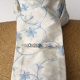 Ivory embroidered blue flower pure silk stock self tie