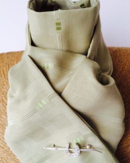 Subtle sage green riding stock with a small square motif, self tie.